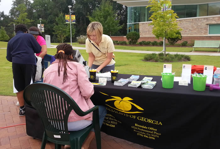 Amy conducting free screenings at Riverdale 5K. Amy conducting free screenings at Riverdale 5K.